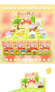 Set of cute Mushroom Elves mini resin figures displayed in their colorful retail box