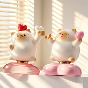 Lot de deux mignonnes figurines de chat en résine avec bases rotatives et détails de cœurs