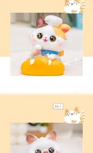 Close-up of a cute white and orange resin cat figurine with a chef hat and bread
