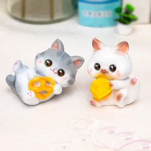 Set of two cute cat resin figurines holding bread and fruit for desktop decoration gift