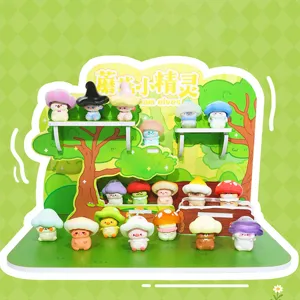 A collection of cute mushroom elf resin figures displayed on a themed forest stand