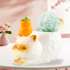 Décoration de bureau créative en forme de chat avec une grande pierre de cristal verte