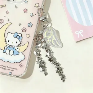 Detail shot of shimmering angel wing keychain with star tassel chains on phone case