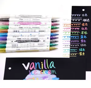 Close-up detail of metallic glitter marker pens with colorful ink swatches on black paper.