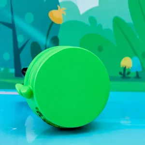 Detailed macro view showing the bottom texture of a green resin panda spinning toy