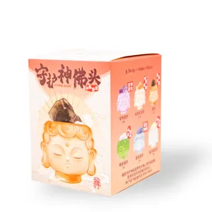 Detailed view of Patron Saint Buddha Head blind box packaging showing various designs