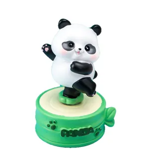 Cute rotating panda resin figurine on green bamboo base for home office desk decor