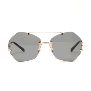 Detailed front view of irregular rimless sunglasses with a gold metal double bridge design