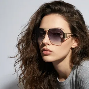 Detail shot of rimless square metal sunglasses with gradient lenses for Y2K street style