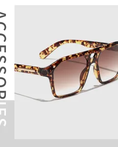 Macro view showing the hollow double-bridge and tortoise shell pattern of these sunglasses