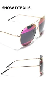 Detail view of aviator sunglasses with gold metal frame and pink striped lenses