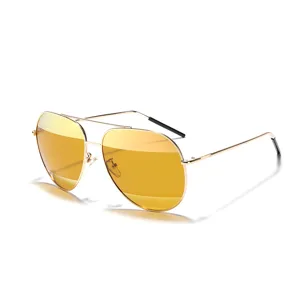 Classic aviator sunglasses with gold metal frame and yellow tinted lenses for men and women