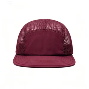 Detail of breathable maroon 5-panel mesh trucker hat for outdoor sports and camping