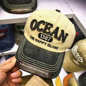 Nahaufnahme der Vintage-Baseballkappe mit 'OCEAN 1387' Stickerei und Lederdetails