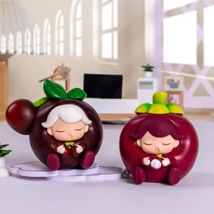 Schattige cartoon hars figuurtjes met fruit thema voor bureau decoratie.