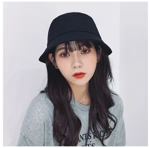 Asian female model wearing a stylish black cotton bucket hat for sun protection