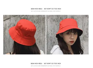 Detailed front and back views of a solid red cotton bucket hat for summer sun protection