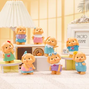 Detailansicht der herzlichen Welpenfiguren als Harz-Deko für den Schreibtisch.