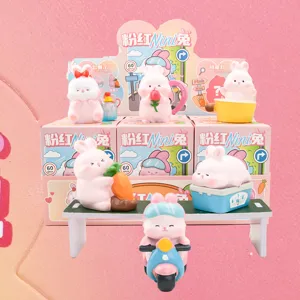 Macro shot of various Pink Nini Rabbit blind box resin figurines in cute poses