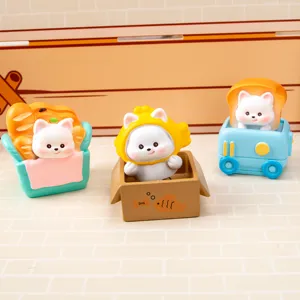 Gros plan détaillé des figurines de la série boulangerie West Highland White Terrier