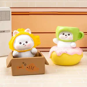 Vue détaillée des figurines en résine Westie Bakery pour une jolie déco de bureau