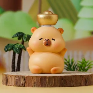 Adorable Capybara blind box figurine with a golden ingot for lucky desktop decoration