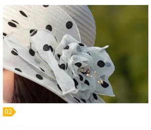 Detailed close-up of the elegant organza flower with pearls on a polka dot sun hat