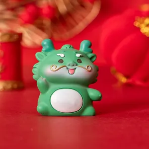 Cute green resin guardian creature figurine for desk decor or cake topper gift