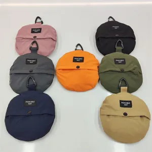 Showcase of seven colorful quick-dry packable bucket hats with hanging carabiners