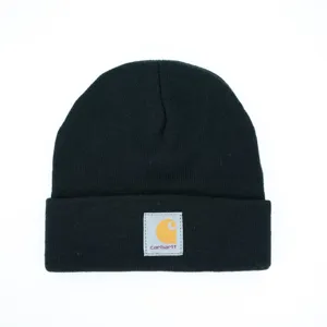 Classic black knit beanie hat featuring an authentic Carhartt logo patch on the front