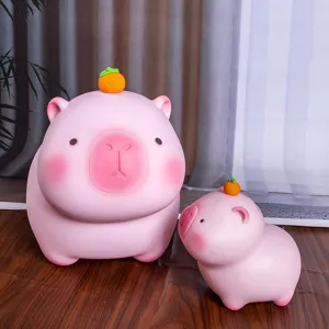 Lindas huchas de carpincho rosa en dos tamaños con una pequeña naranja en la cabeza