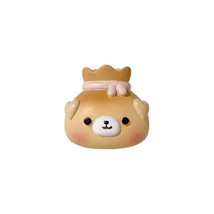Cute cartoon bear resin fridge magnet ornament with a warm brown finish on white background