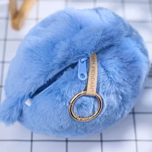 Zachte blauwe pluche monster hanger met ritssluiting en gouden sleutelhanger ring