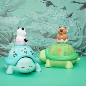 Macro view of cute turtle storage ornaments featuring panda and capybara on lotus flowers
