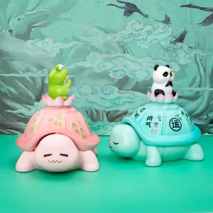 Detailed macro view of cute turtle storage ornaments featuring panda and frog figurines