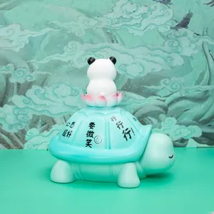Creative mint green turtle and panda storage figurine with motivational Chinese text details