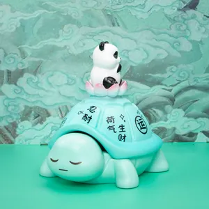 Detailed view of a cyan turtle storage ornament with a cute panda on a lotus lid