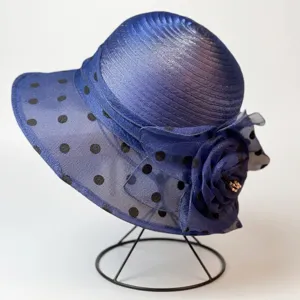 Elegant blue organza sun hat with black polka dots and large floral accent for women