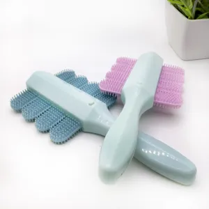 Silicone pet grooming brush detail view, soft massage bristles for cats and dogs care.