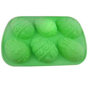Molde de silicona verde para hornear con 6 cavidades, diseño de conejito y huevos de Pascua DIY.