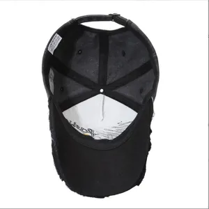 Close-up interior view of a black distressed cotton baseball cap showing quality construction