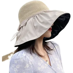 Wide-brim sun hat with black vinyl coating and woven straw top for summer UV protection