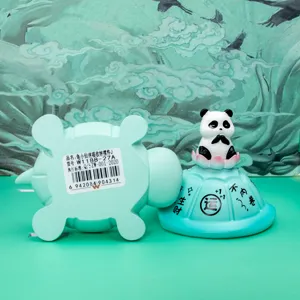 Detail view of panda turtle storage jar with Chinese lucky text and product label