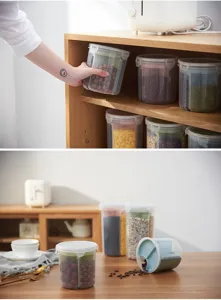 Recipiente de almacenamiento de alimentos de plástico transparente dividido para granos secos.
