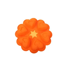 Detalle del molde de silicona naranja de 6 corazones con centro de estrella para jabón.