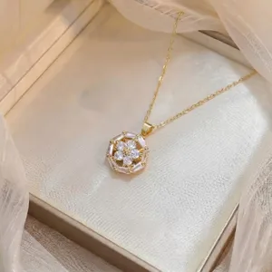 Elegant gold plated necklace with flower zircon pendant displayed in gift box