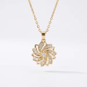 Elegant rotatable flower pendant necklace in gold-plated titanium steel with zirconia.