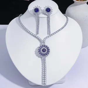 Élégant ensemble collier fleur de zircon violet et boucles d'oreilles à longs glands