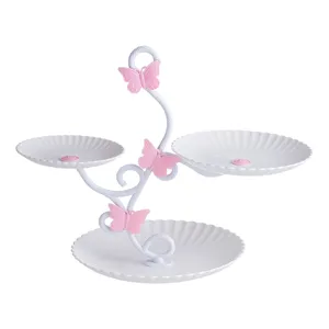 White 3-tier dessert stand with pink butterfly decorations for parties and afternoon tea display.