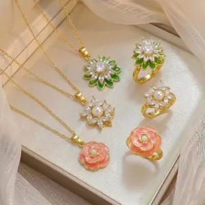 Detailed view of elegant floral necklace and ring set with micro-paved zircon and pearls